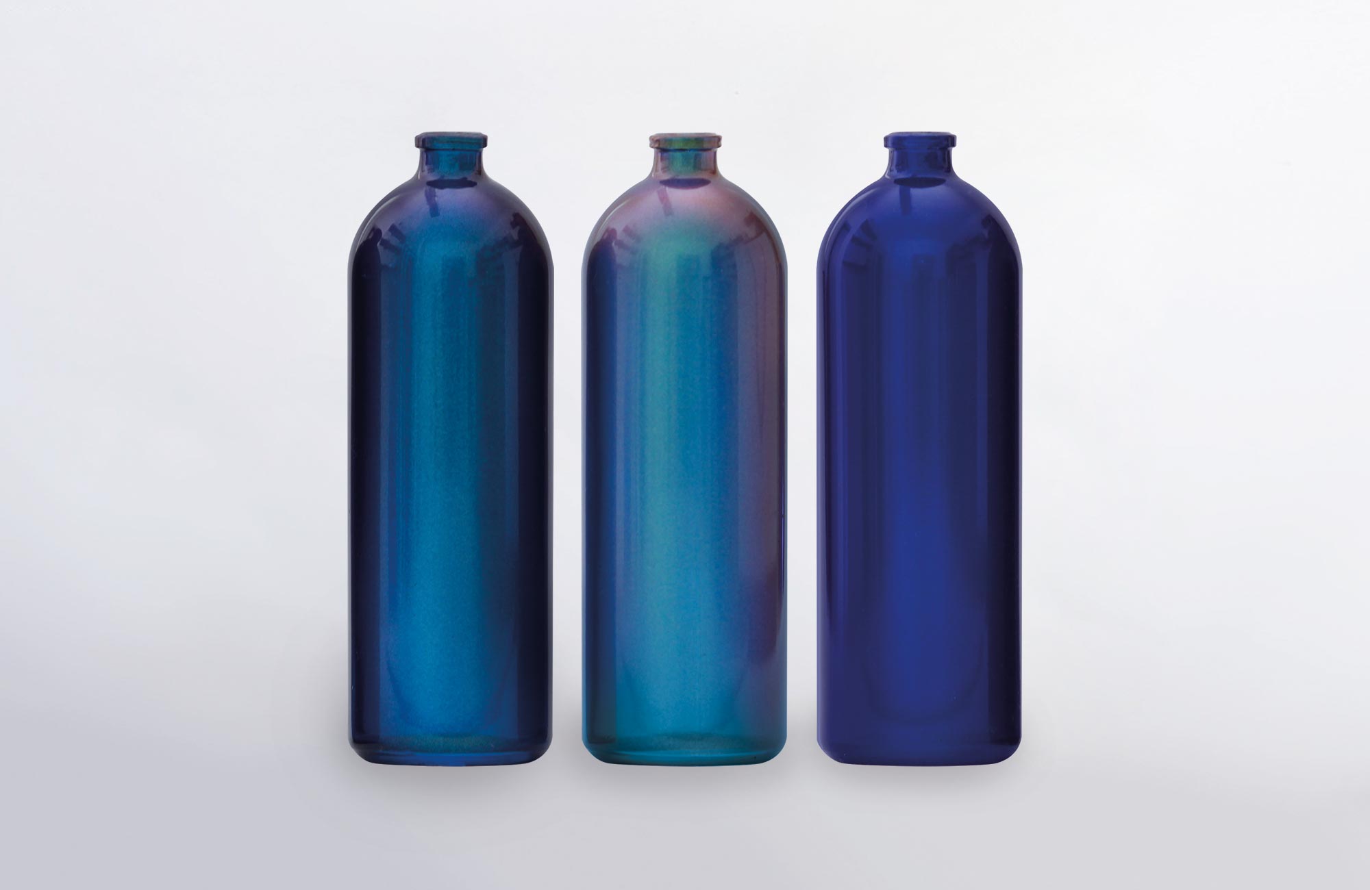 Iridescent metallic glass finishes